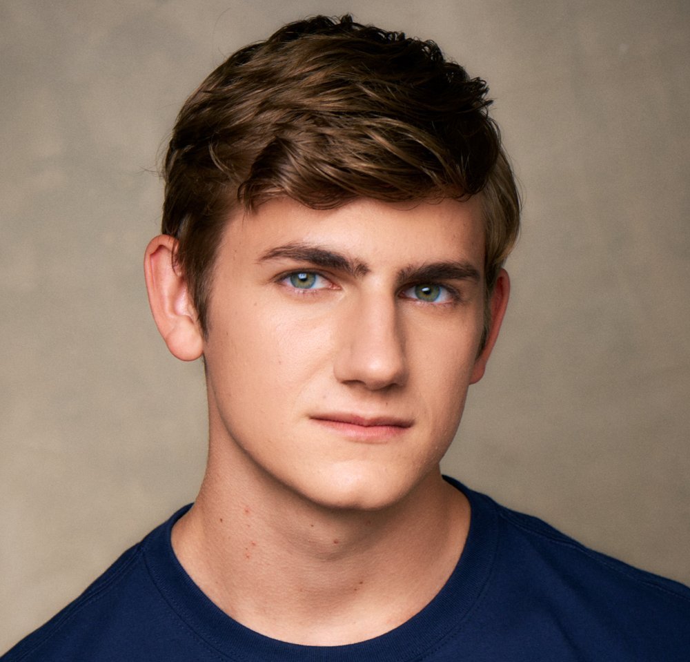 Standa Vecera studio headshot in navy t-shirt, close crop