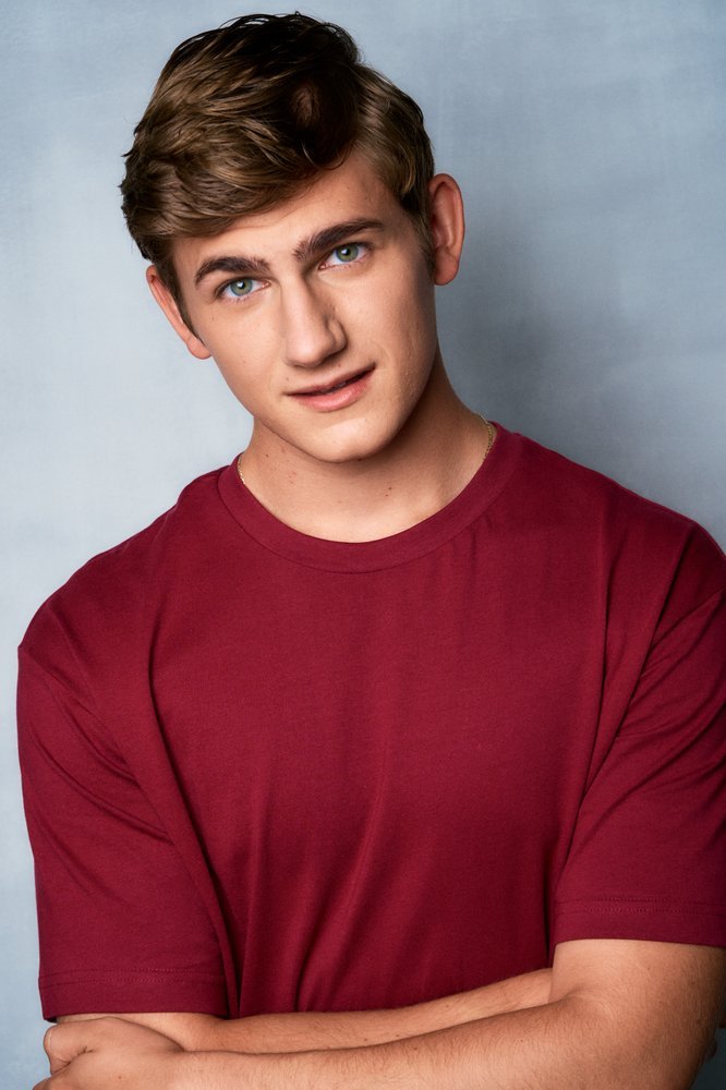 Standa Vecera studio headshot in maroon t-shirt