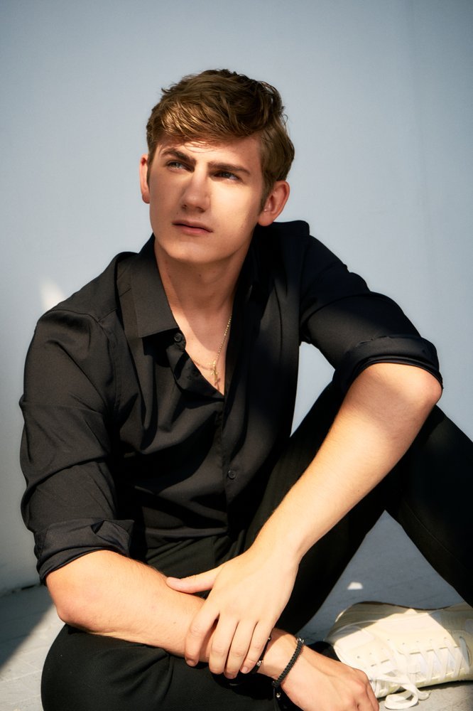 Standa Vecera editorial portrait, seated